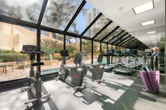 a view of a gym with large windows