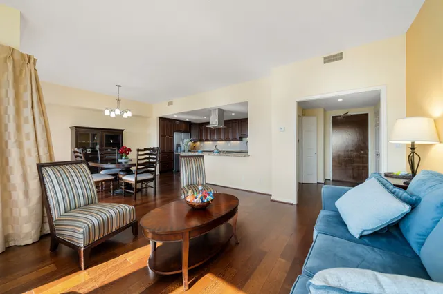 a living room with furniture and a table