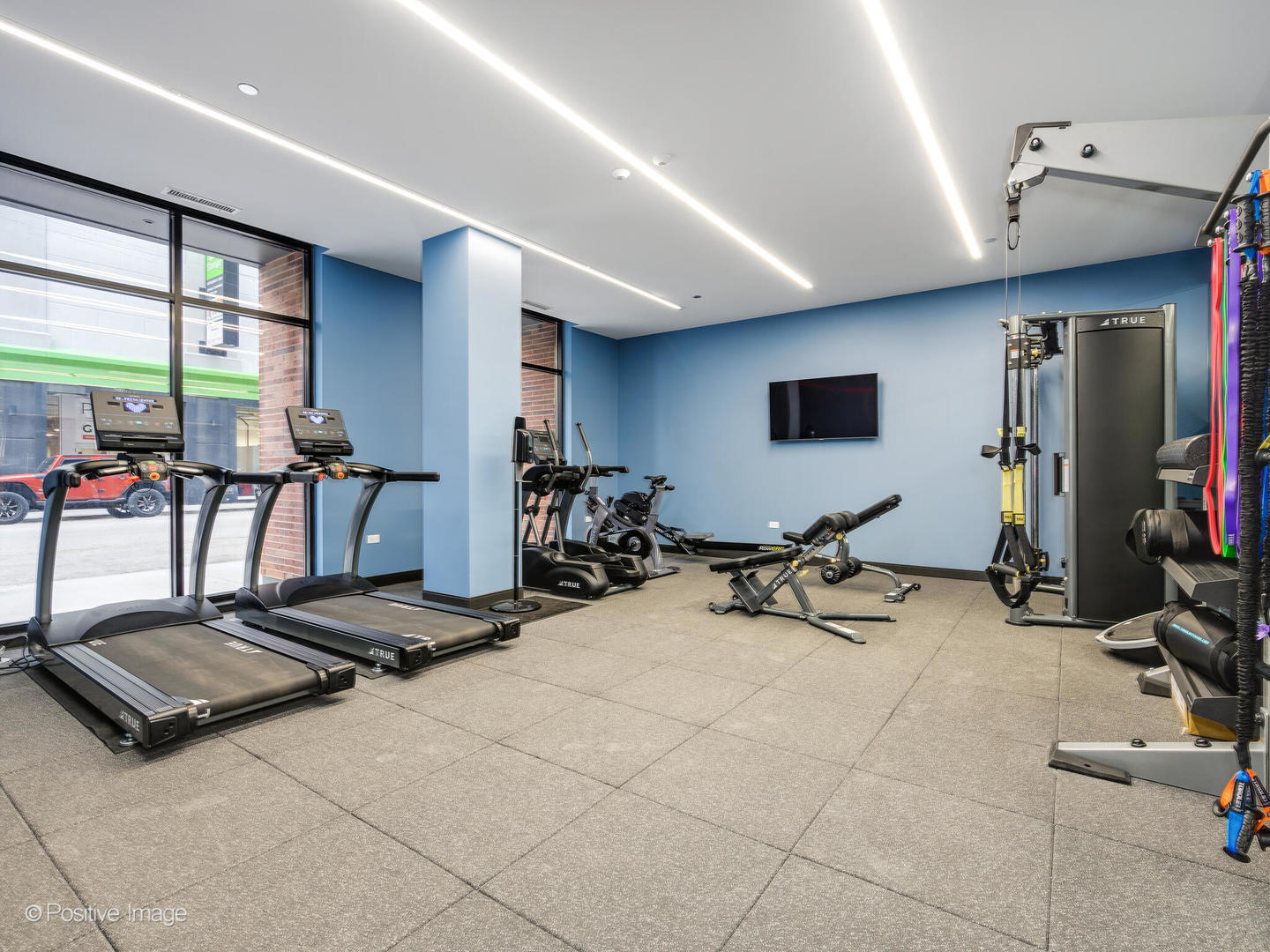 313 South Racine Avenue, Unit PHB Chicago, IL 60607 - Photo 30 of 30 a view of a room with gym equipment