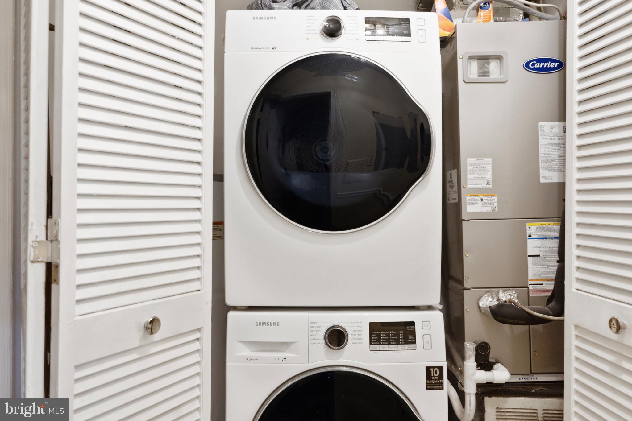 14106 William Street, Unit 19B Laurel, MD 20707 - Photo 23 of 31 a view of livingroom with washer and dryer