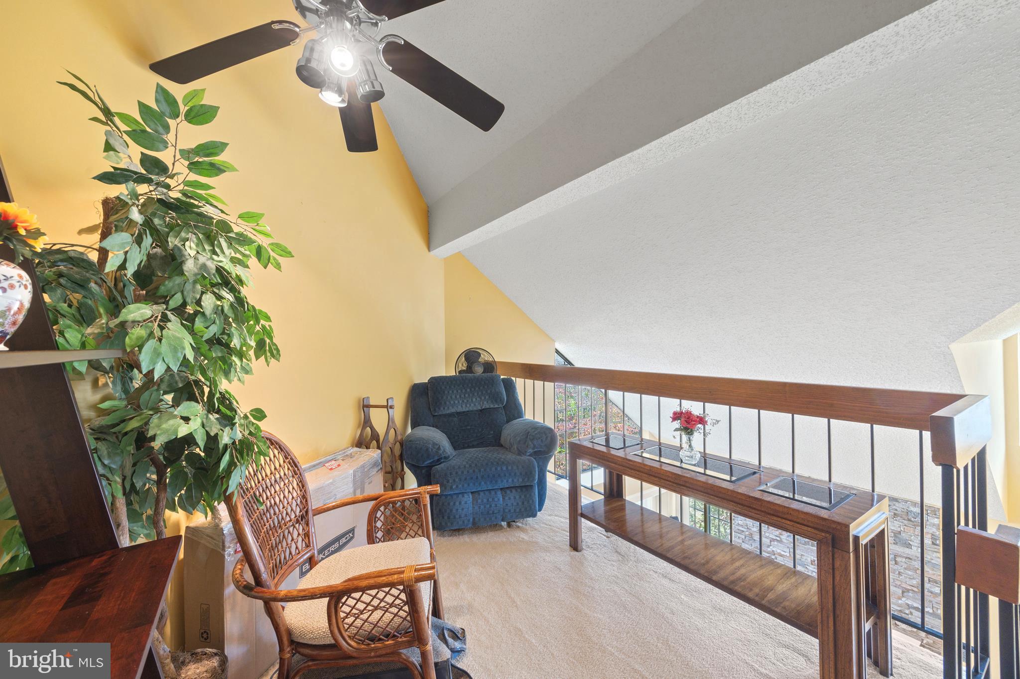 14106 William Street, Unit 19B Laurel, MD 20707 - Photo 25 of 31 a stair with glass top table and chairs