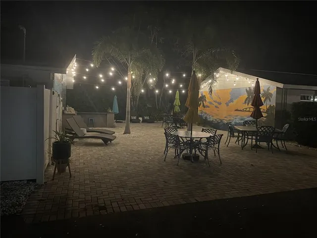 a view of a lobby with furniture and floor to ceiling window