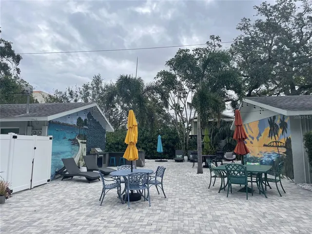 a view of a fireplace and potted plant