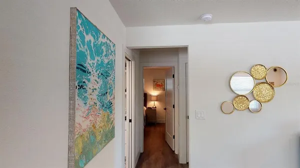 a bathroom with a toilet a sink and a mirror