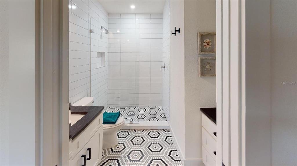 1910 Morrill Street Sarasota, FL 34236 - Photo 24 of 52 a bathroom with a bathtub and shower