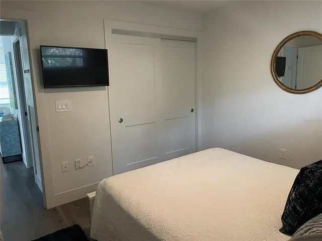 a kitchen with a table and chairs