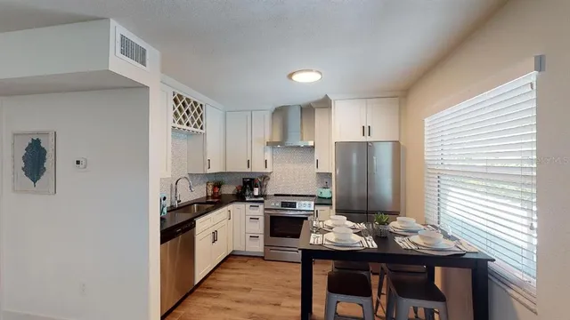 a bathroom with a toilet and a sink