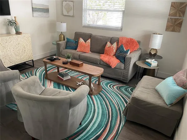 a living room with furniture and a couch