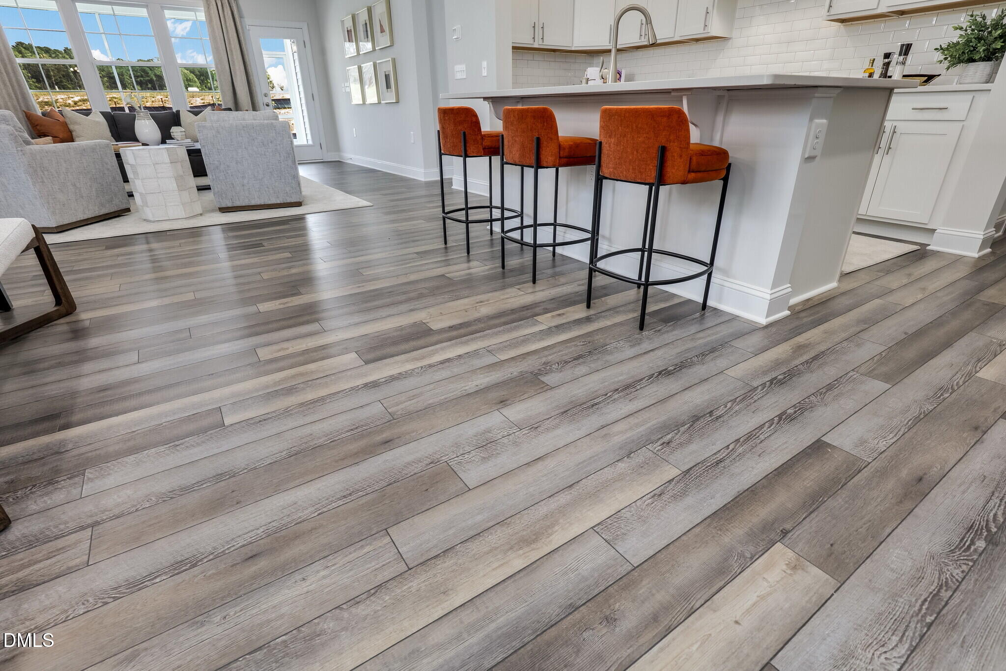 112 Fablewood Trail Garner, NC 27529 - Photo 13 of 39 a living room with furniture wooden floor and a table