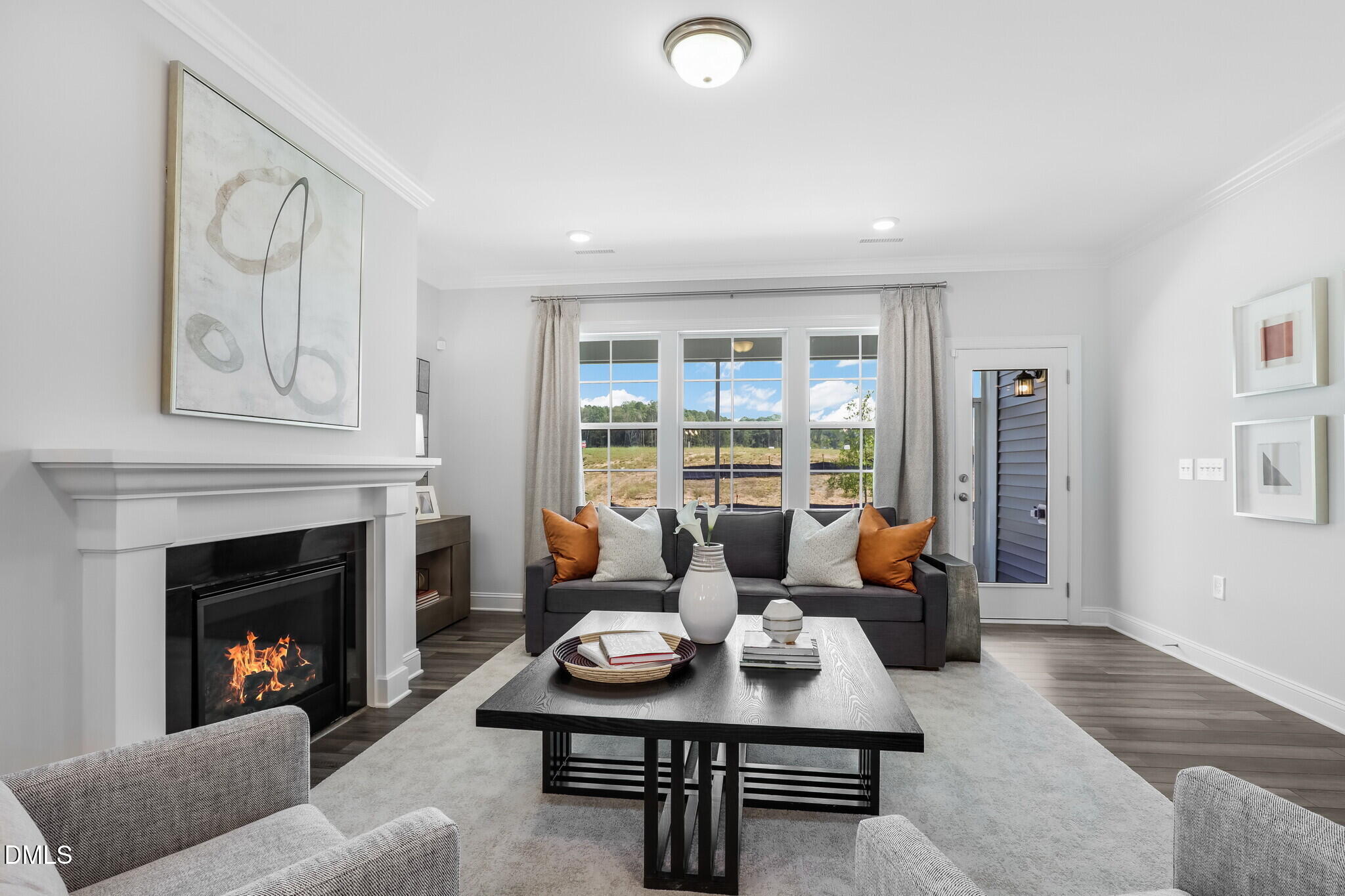112 Fablewood Trail Garner, NC 27529 - Photo 18 of 39 a living room with furniture fireplace and a large window