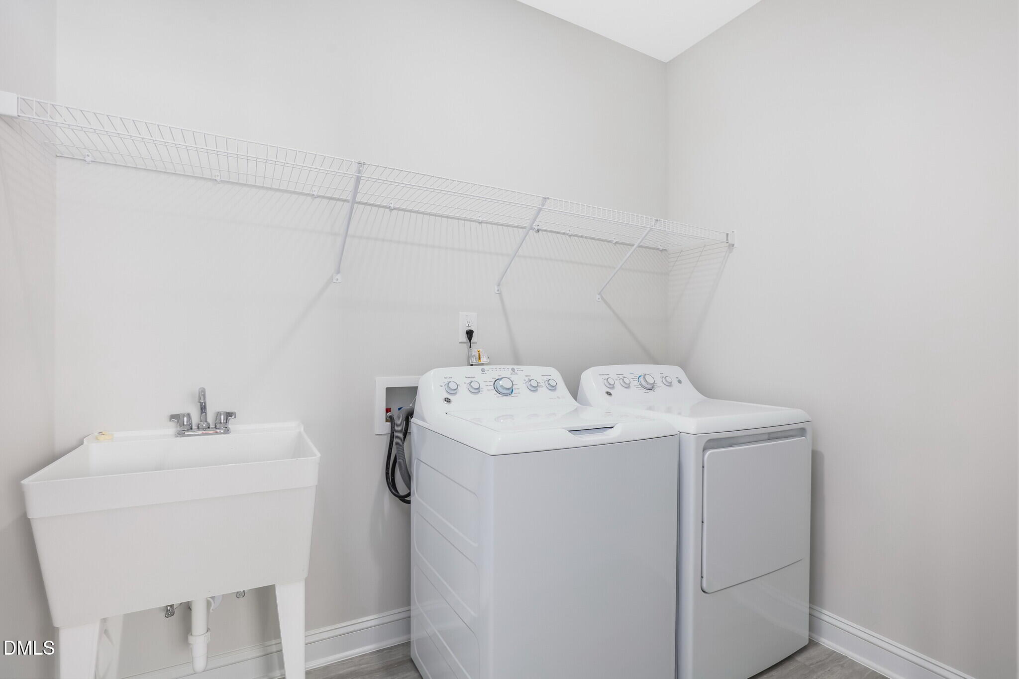 112 Fablewood Trail Garner, NC 27529 - Photo 25 of 39 a utility room with dryer and washer