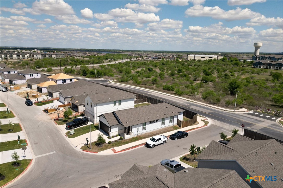 149 Cutleaf, Unit 31 San Marcos, TX 78666 - Photo 19 of 26 an aerial view of a residential house with outdoor space and seating