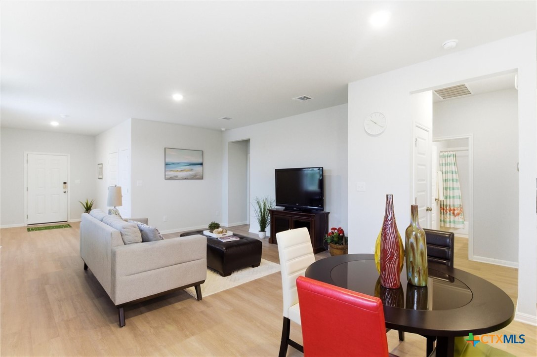 149 Cutleaf, Unit 31 San Marcos, TX 78666 - Photo 7 of 26 a living room with furniture and a flat screen tv