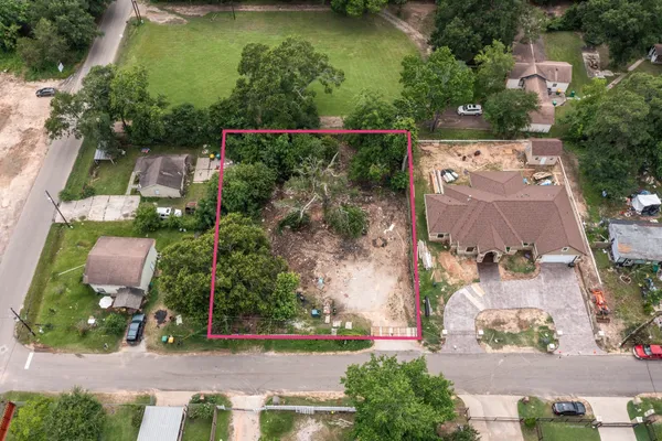 an aerial view of residential house with outdoor space