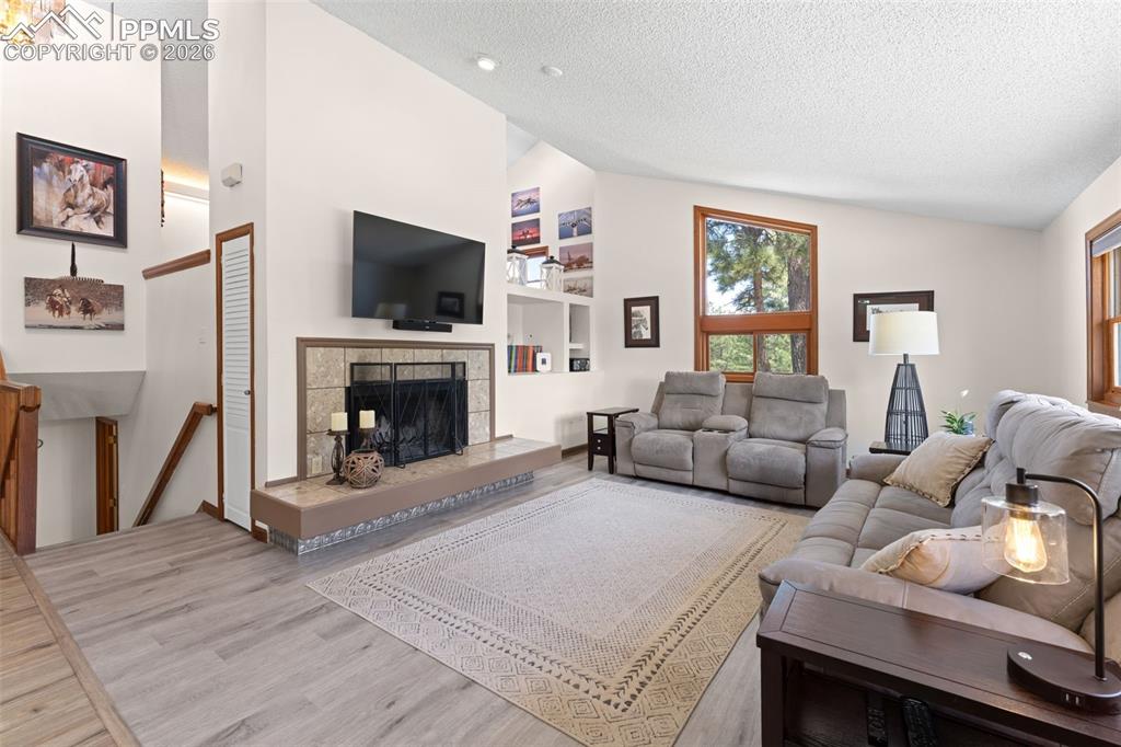 1851 Buttercup Road Elizabeth, CO 80107 - Photo 8 of 47 a living room with furniture and a flat screen tv