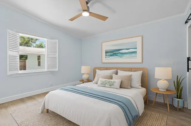 an empty room with windows and closet