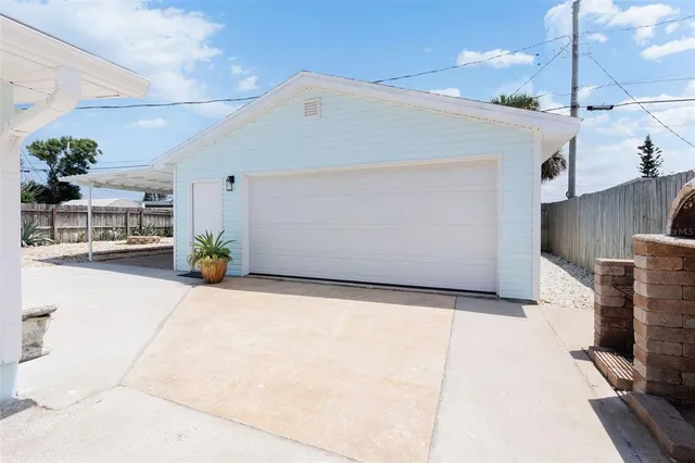 a view of a room that has a bed in it