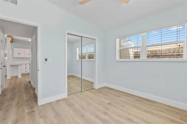 a workspace with furniture and wooden floor