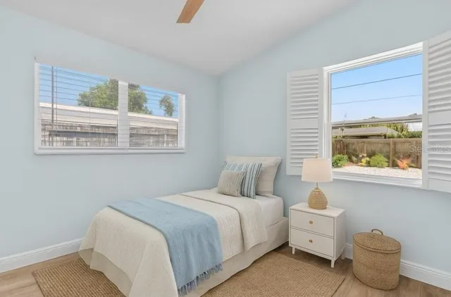 a view of a house with a door and wooden floor