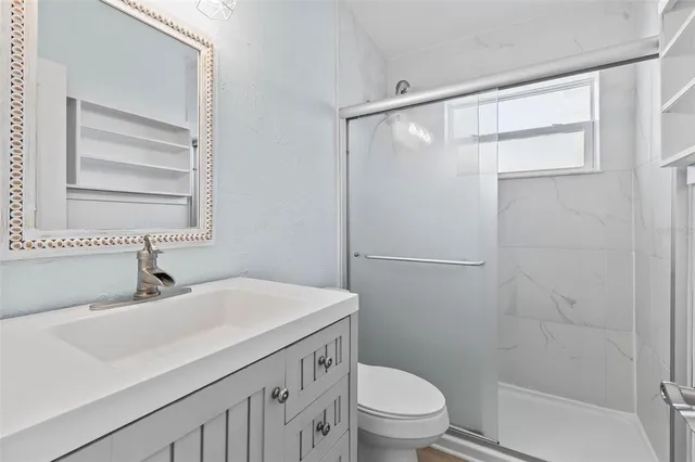 a potted plant sitting in front of a house