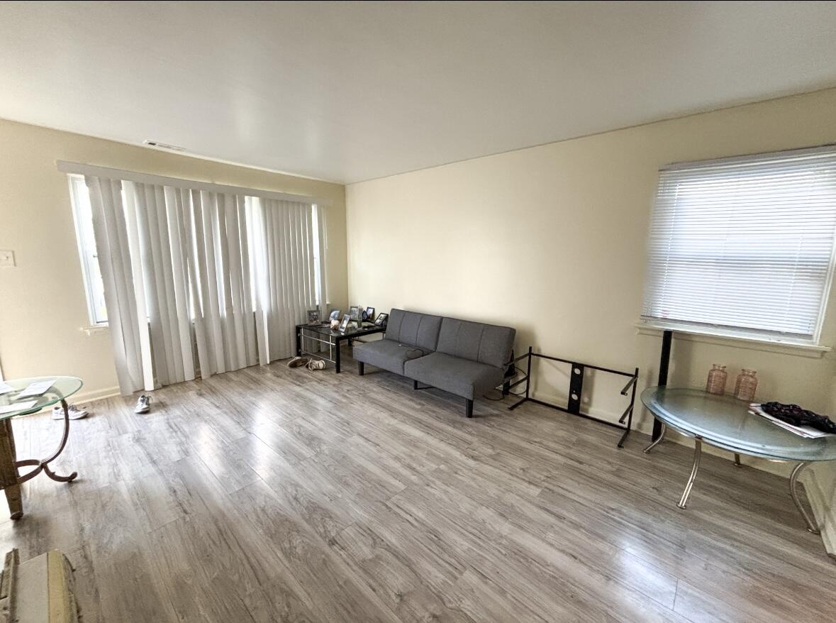 1163 Allen Street Gary, IN 46403 - Photo 5 of 13 a living room with furniture and a window
