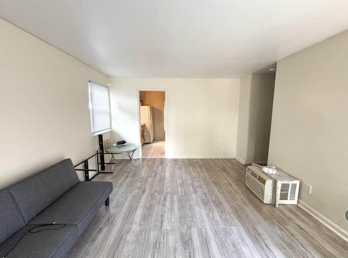 1163 Allen Street Gary, IN 46403 - Photo 6 of 13 a view of wooden floor and chairs in a room