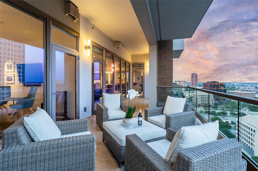 2300 Wolf Street, Unit 18A Dallas, TX 75201 - Photo 27 of 40 a outdoor space with patio the couches and a table