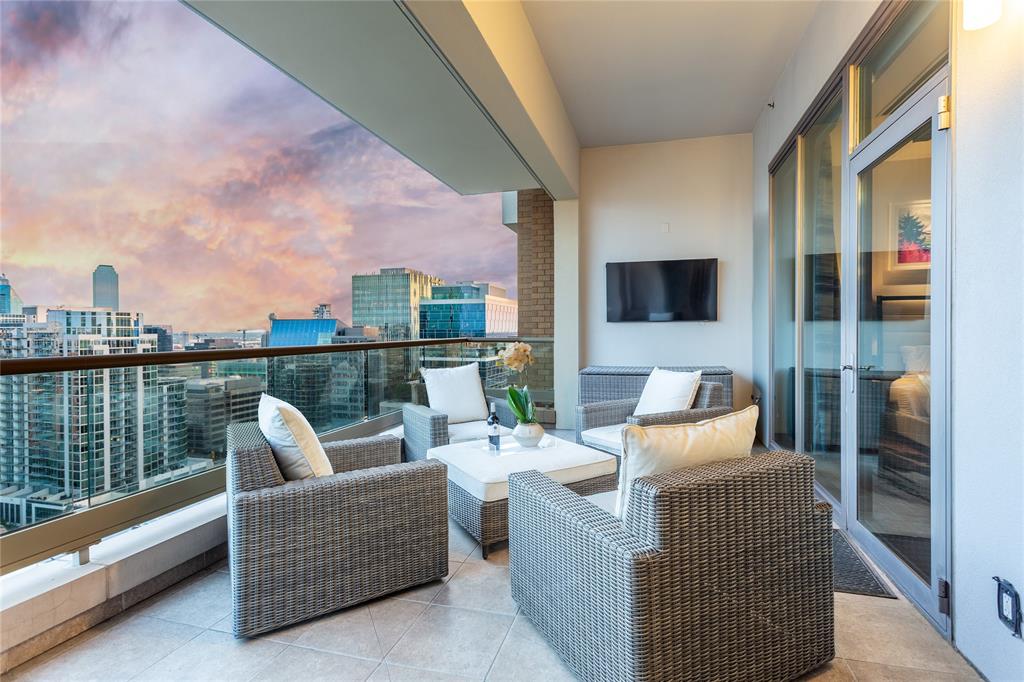 2300 Wolf Street, Unit 18A Dallas, TX 75201 - Photo 28 of 40 a roof deck with couches and potted plants