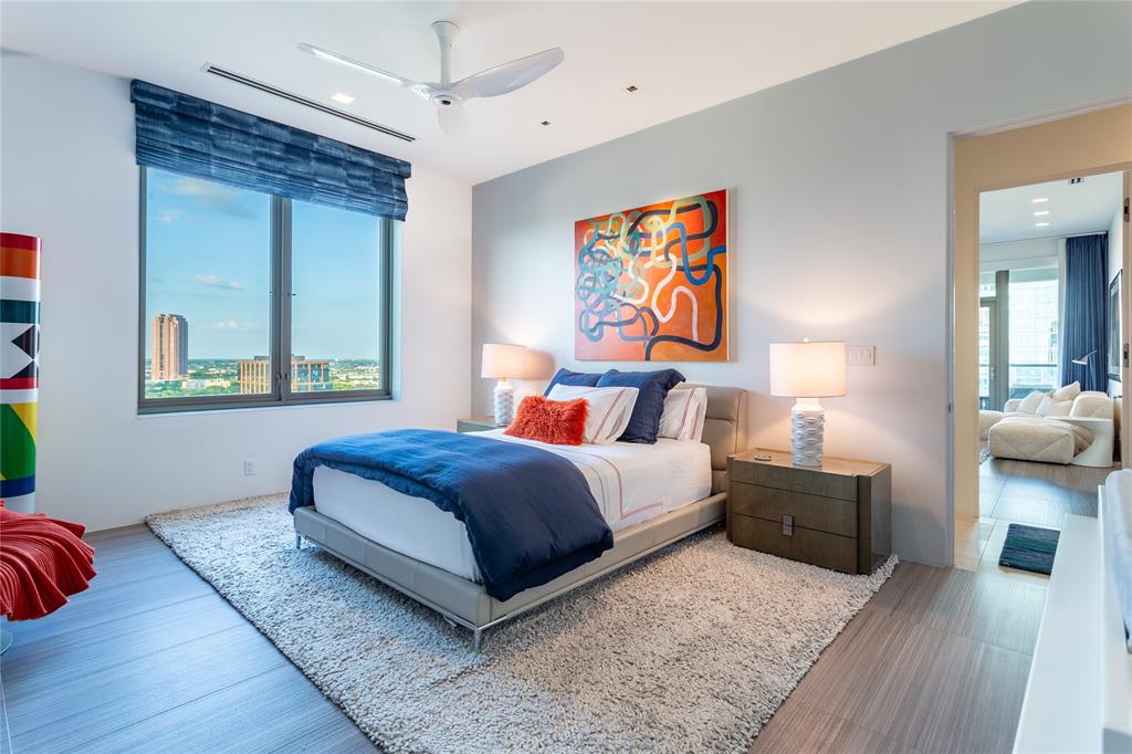 2300 Wolf Street, Unit 18A Dallas, TX 75201 - Photo 31 of 40 a bedroom with a bed and window