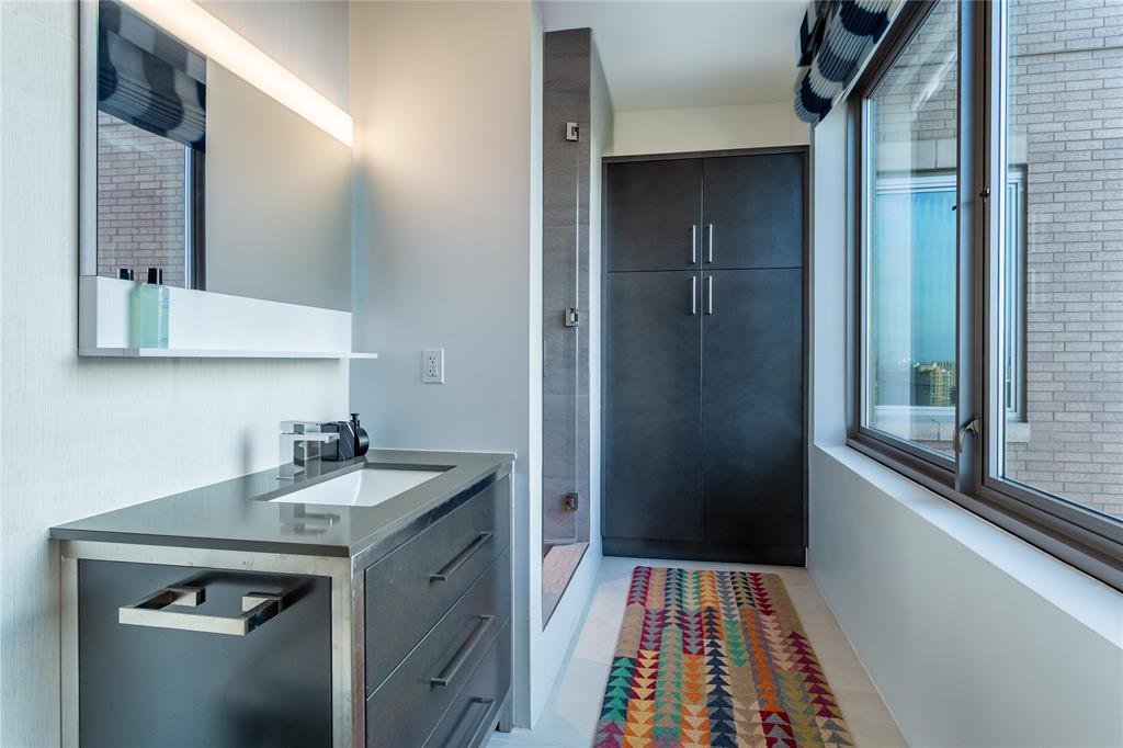 2300 Wolf Street, Unit 18A Dallas, TX 75201 - Photo 32 of 40 a utility room with sink dryer and washer