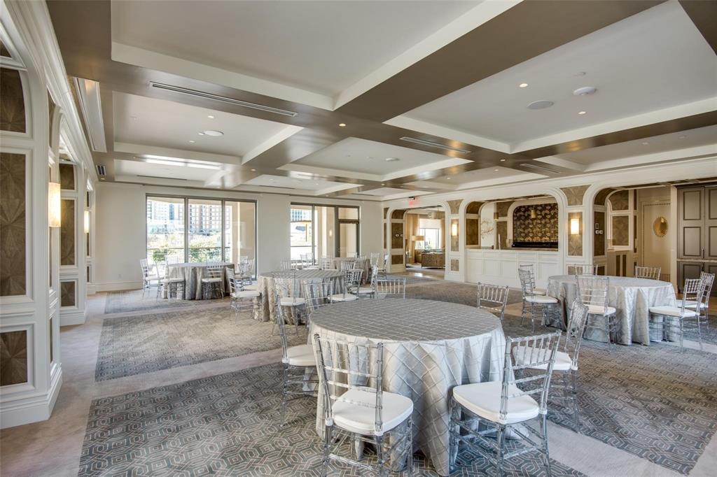 2300 Wolf Street, Unit 18A Dallas, TX 75201 - Photo 36 of 40 a dining room with wooden floor and large windows