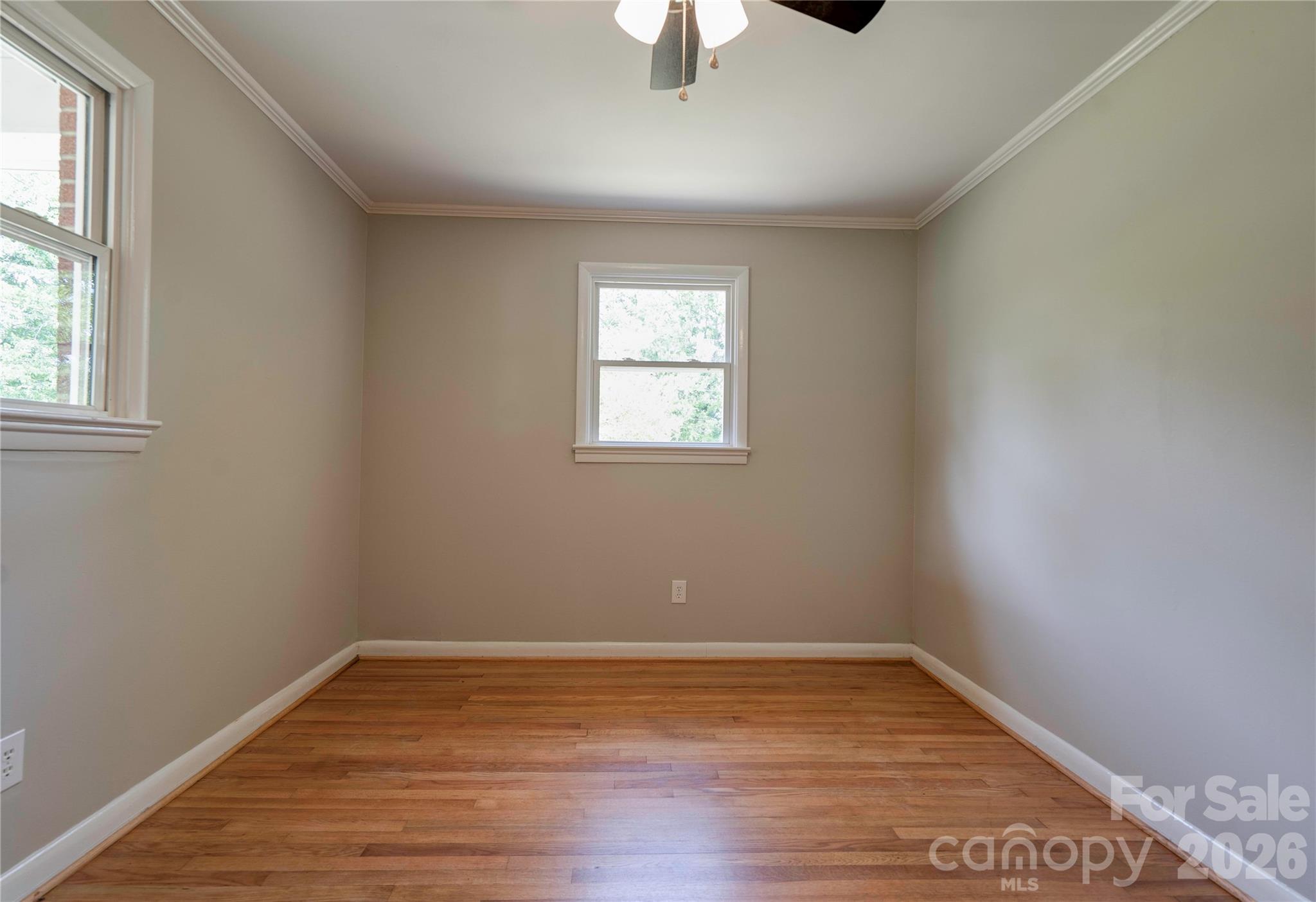 153 Greene Road Forest City, NC 28043 - Photo 15 of 23 wooden floor in an empty room with a window