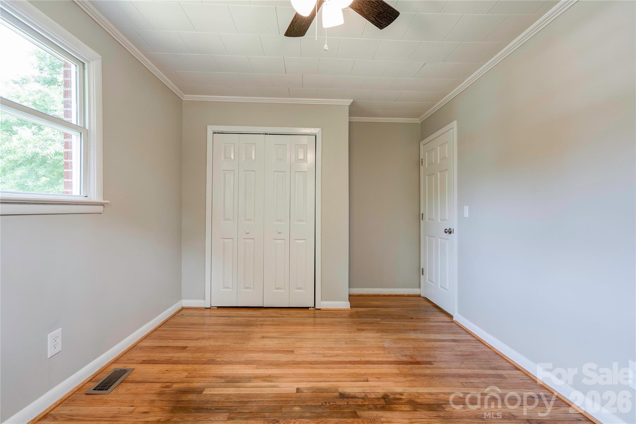 153 Greene Road Forest City, NC 28043 - Photo 23 of 23 a view of empty room with window and ceiling fan