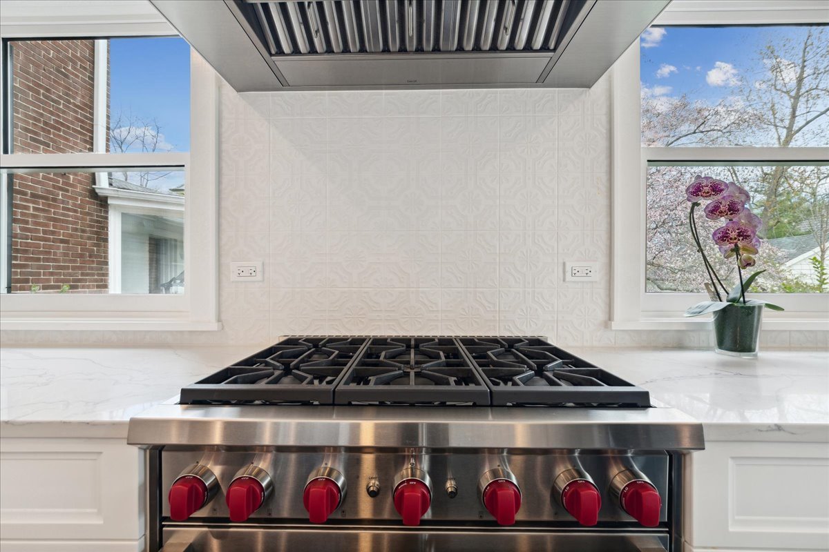 230 Oxford Road Kenilworth, IL 60043 - Photo 16 of 54 a stove top oven sitting inside of a kitchen