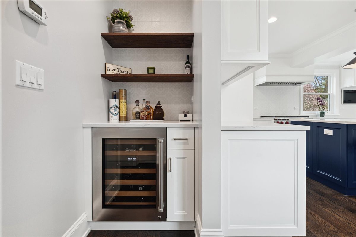 230 Oxford Road Kenilworth, IL 60043 - Photo 17 of 54 a kitchen with stainless steel appliances a refrigerator and cabinets