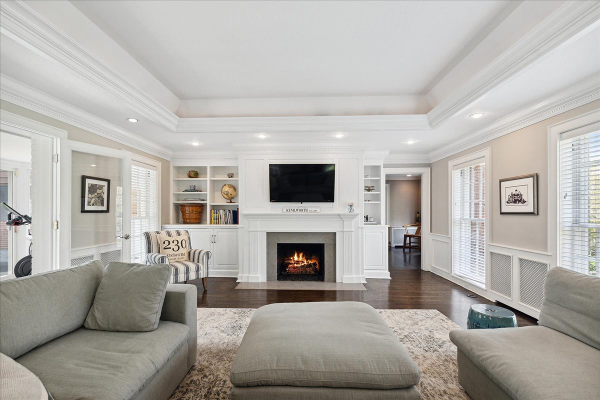 230 Oxford Road Kenilworth, IL 60043 - Photo 20 of 54 a living room with furniture and a fireplace