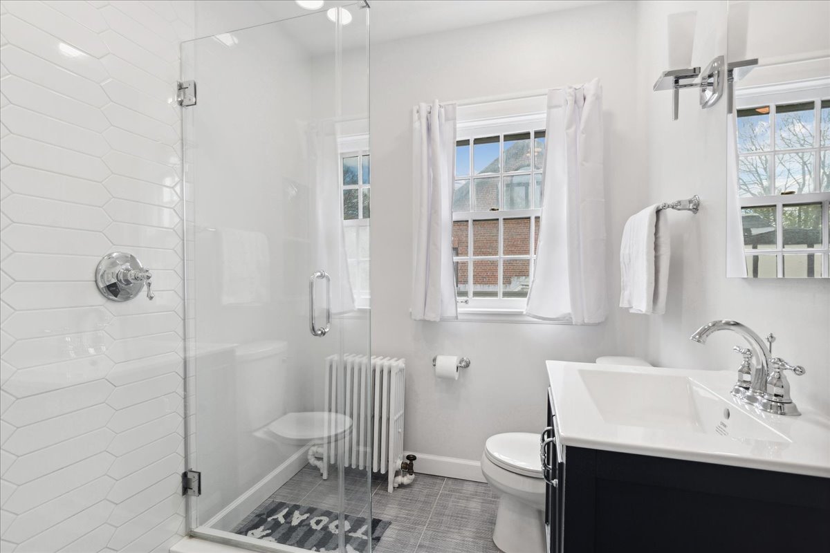 230 Oxford Road Kenilworth, IL 60043 - Photo 36 of 54 a bathroom with a sink toilet and shower