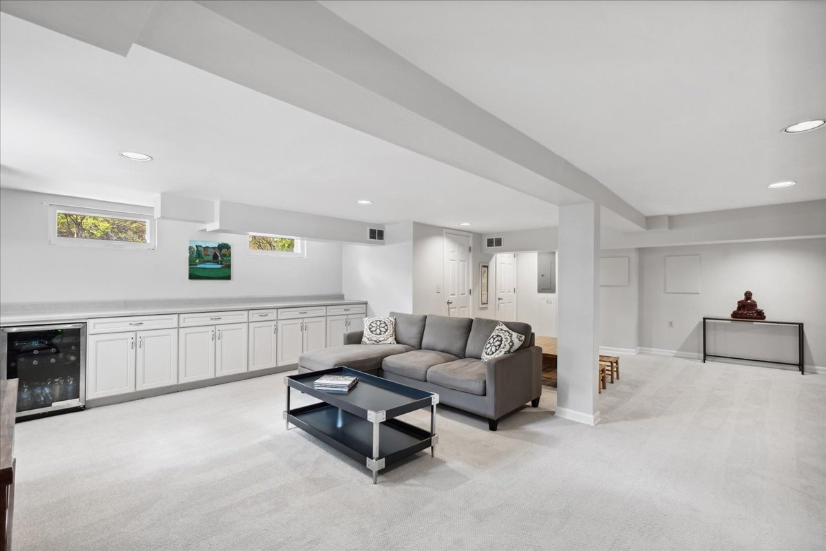 230 Oxford Road Kenilworth, IL 60043 - Photo 43 of 54 a living room with furniture and a window