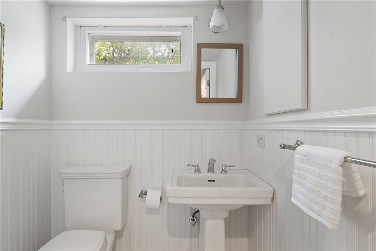 230 Oxford Road Kenilworth, IL 60043 - Photo 45 of 54 a bathroom with a sink and a toilet