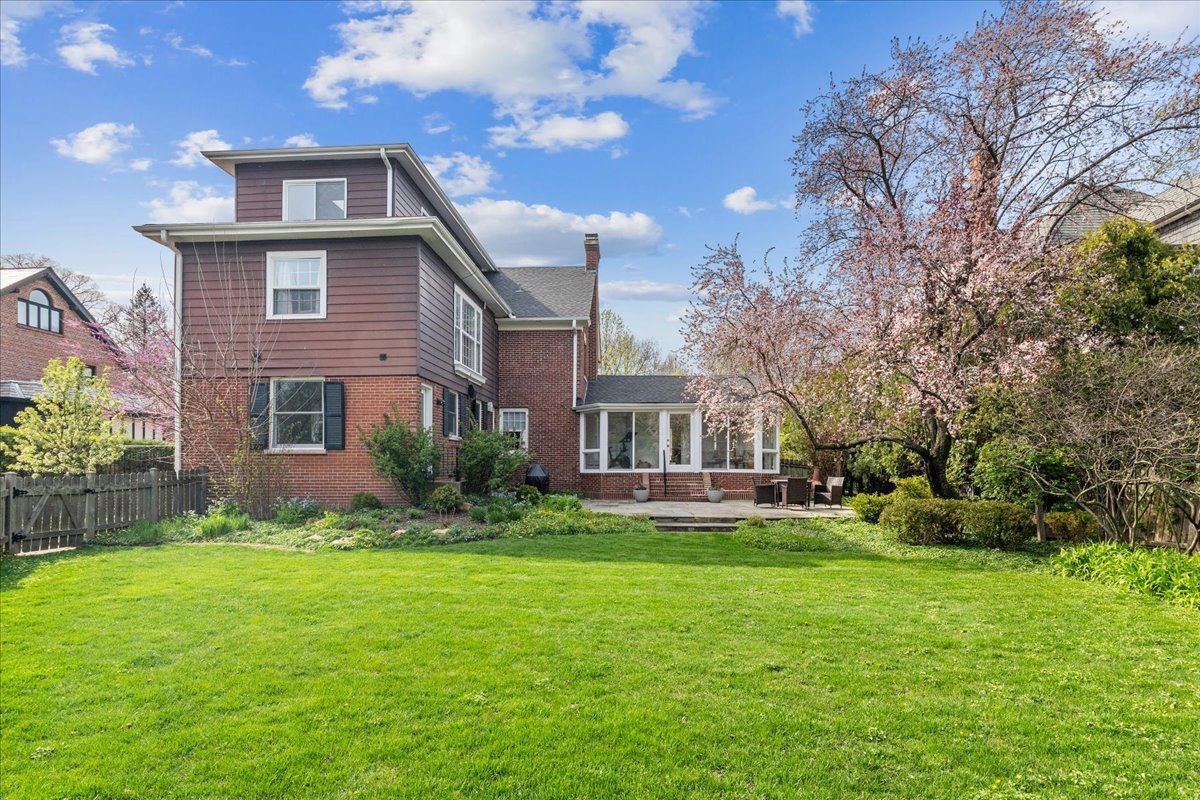 230 Oxford Road Kenilworth, IL 60043 - Photo 48 of 54 a front view of a house with a yard