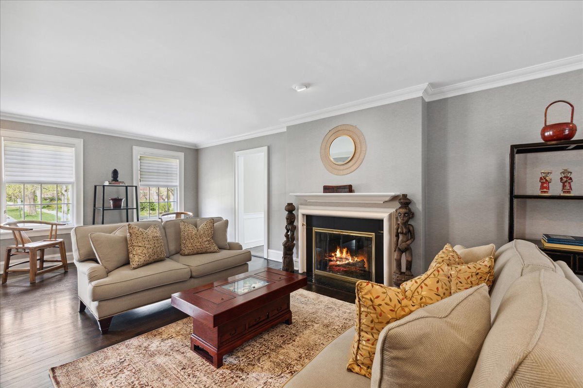 230 Oxford Road Kenilworth, IL 60043 - Photo 7 of 54 a living room with furniture and a fireplace