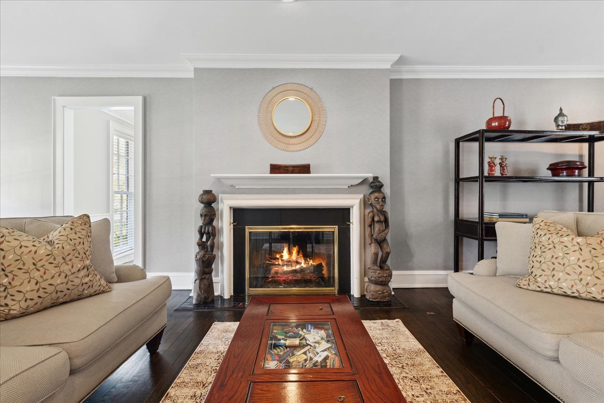 230 Oxford Road Kenilworth, IL 60043 - Photo 8 of 54 a living room with furniture and a fireplace