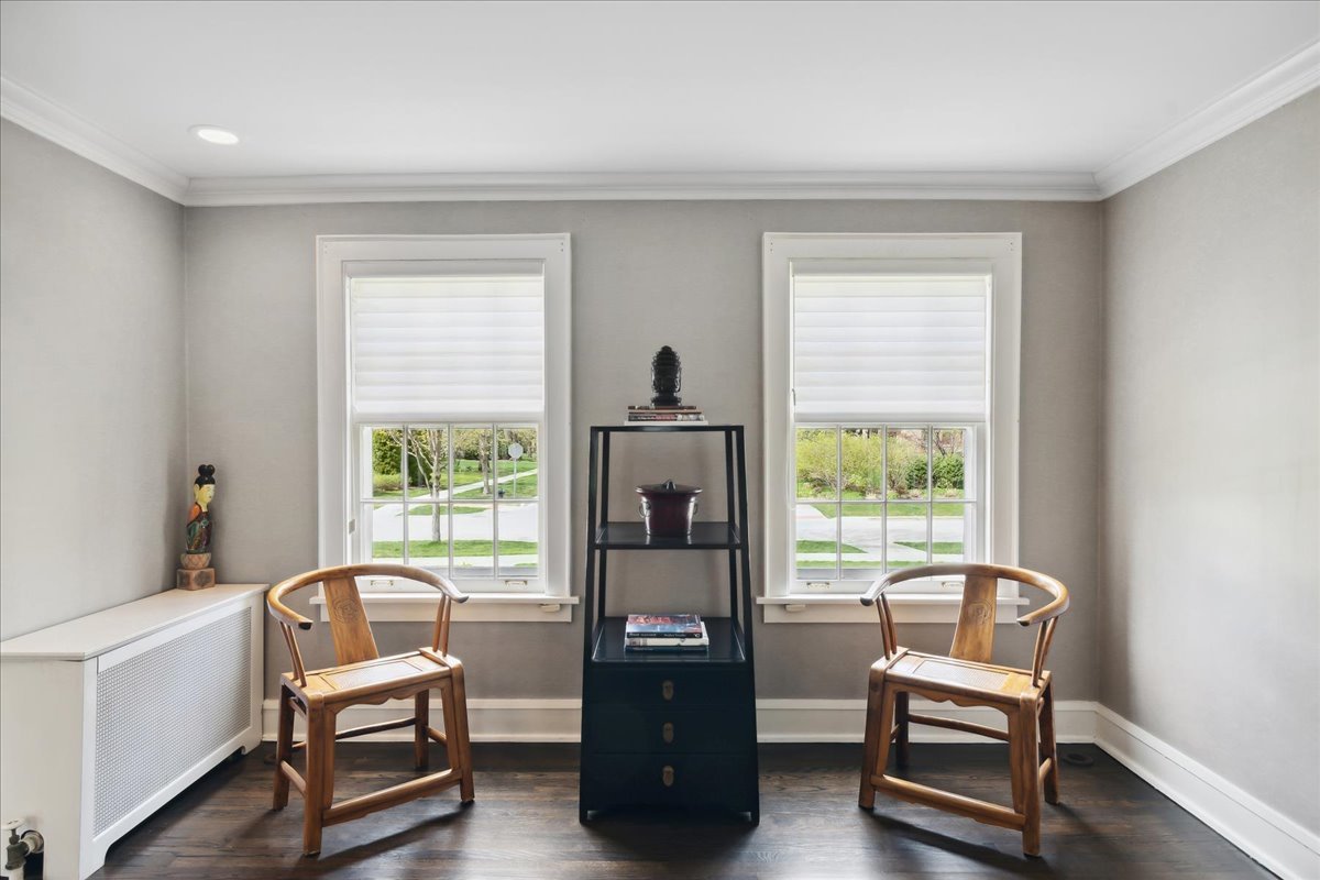 230 Oxford Road Kenilworth, IL 60043 - Photo 9 of 54 a room with lounge chair and windows