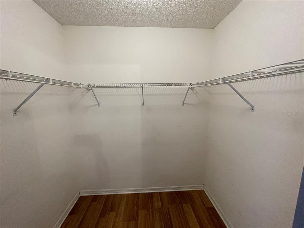 6034 East Peach Street Inverness, FL 34452 - Photo 13 of 16 a view of a room with racks on the wall