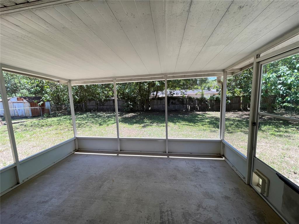 6034 East Peach Street Inverness, FL 34452 - Photo 16 of 16 a view of an empty room with windows