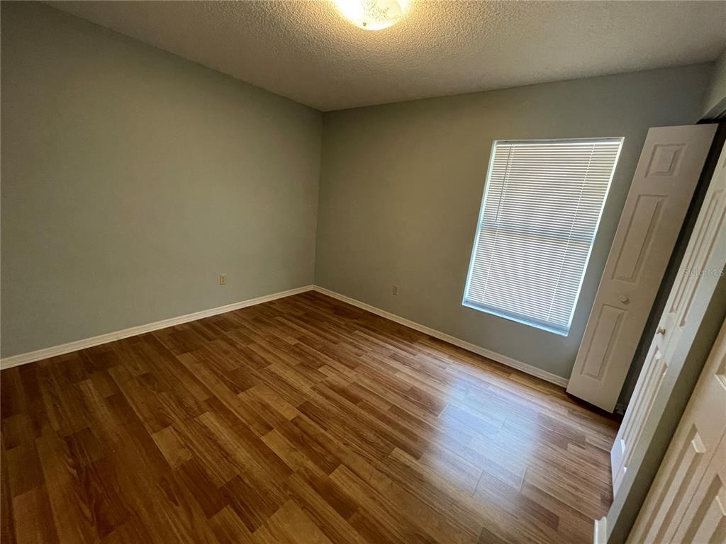 6034 East Peach Street Inverness, FL 34452 - Photo 10 of 16 a view of empty room with wooden floor