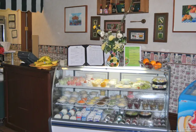 a group of people sitting at tables in a room