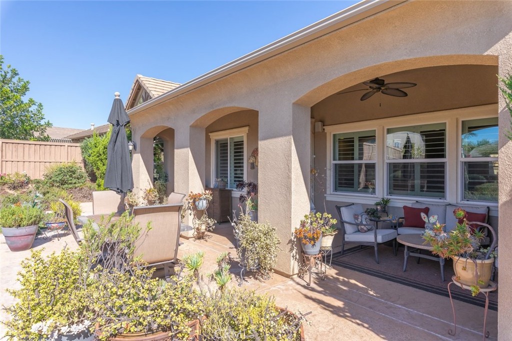 227 Tom McGuinness Jr Circle Fallbrook, CA 92028 - Photo 37 of 42 a front view of a house with outdoor seating
