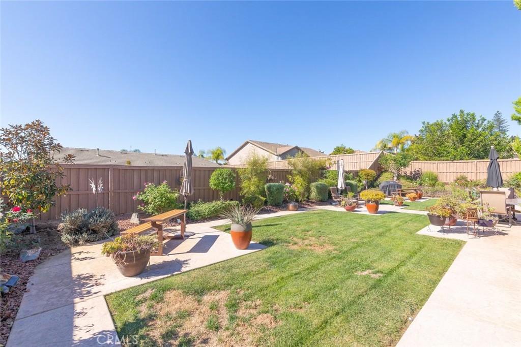 227 Tom McGuinness Jr Circle Fallbrook, CA 92028 - Photo 39 of 42 a swimming pool with outdoor seating and yard