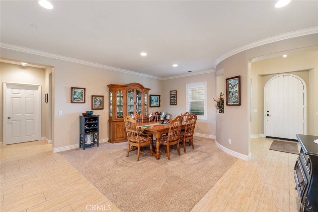 227 Tom McGuinness Jr Circle Fallbrook, CA 92028 - Photo 10 of 42 a living room with furniture a dining table and with furniture